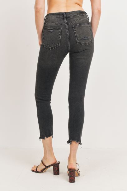 High-rise skinny jeans with distressed hem