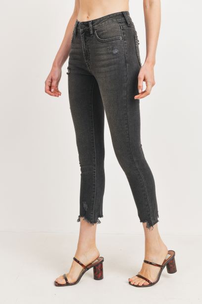 High-rise skinny jeans with distressed hem