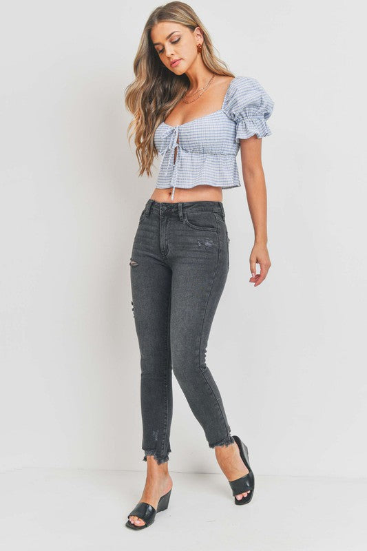 High-rise skinny jeans with distressed hem