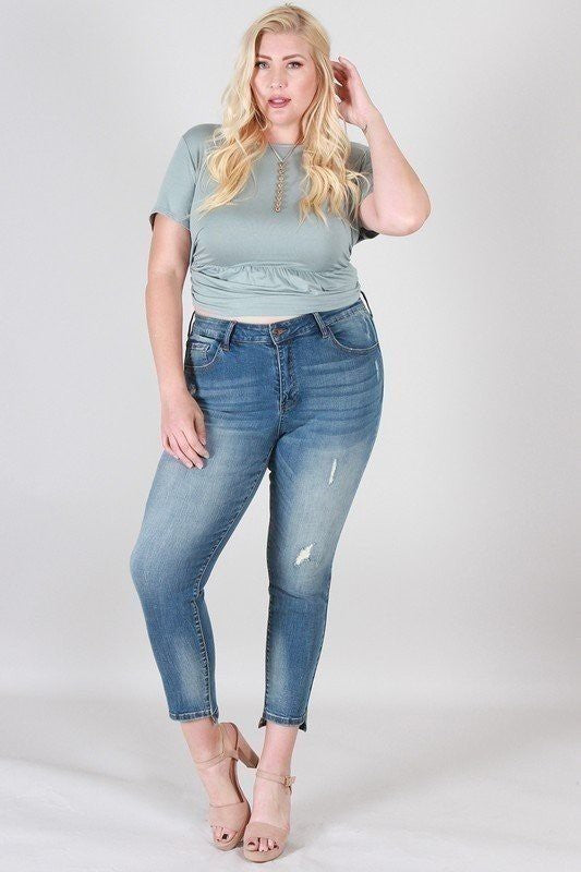 Distressed mid-rise skinny with step hem plus size